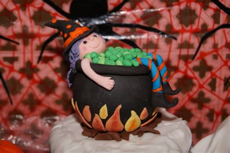 Ptgnant witch cake topper